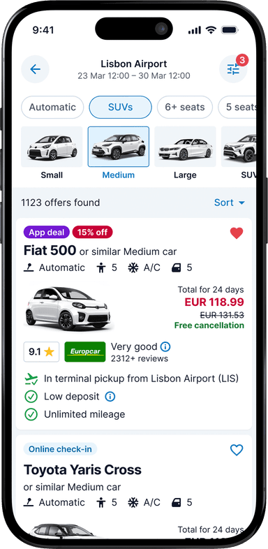 The DiscoverCars.com app opened with the search results for a medium car at Lisbon Airport showing
