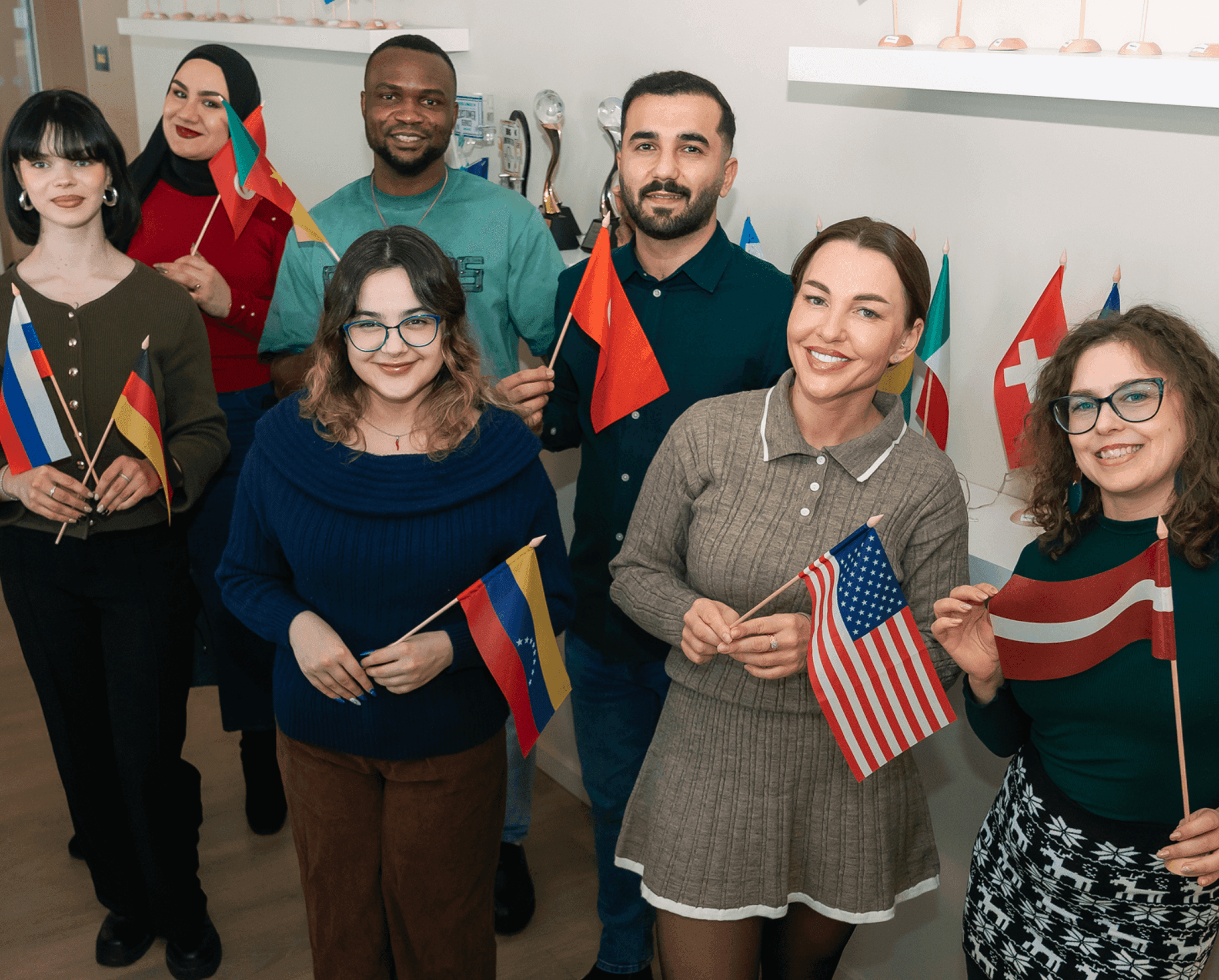 Team members holding flags